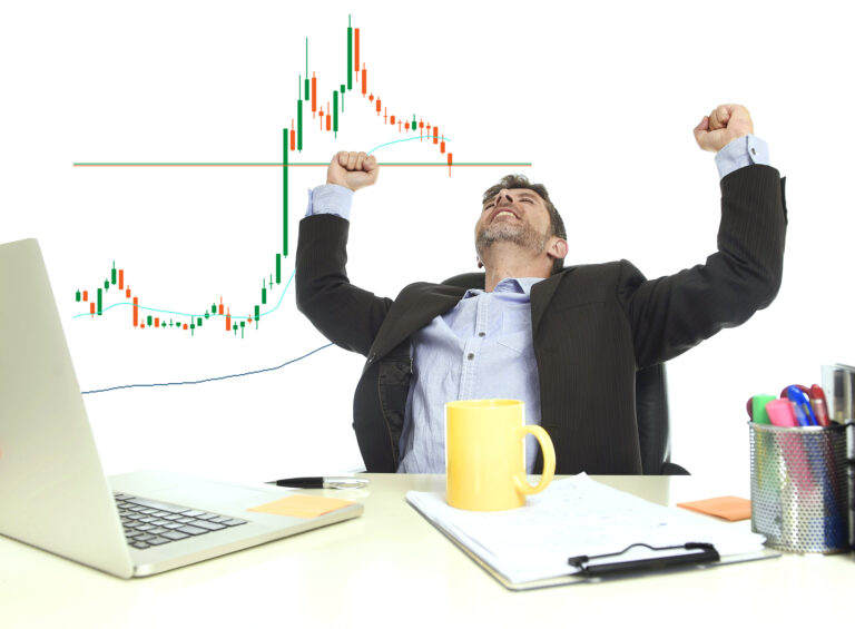 businessman crazy happy after winning forex or stocks trade at o