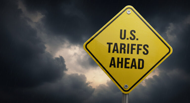 U.S. Tariffs Ahead Warning Sign Against a Dramatic Sky at Sunset Representing Economic Uncertainty