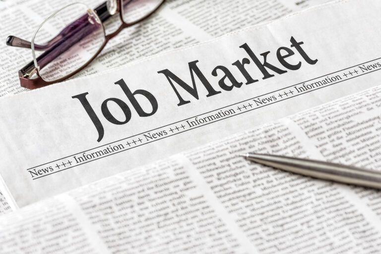 A,Newspaper,With,The,Headline,Job,Market