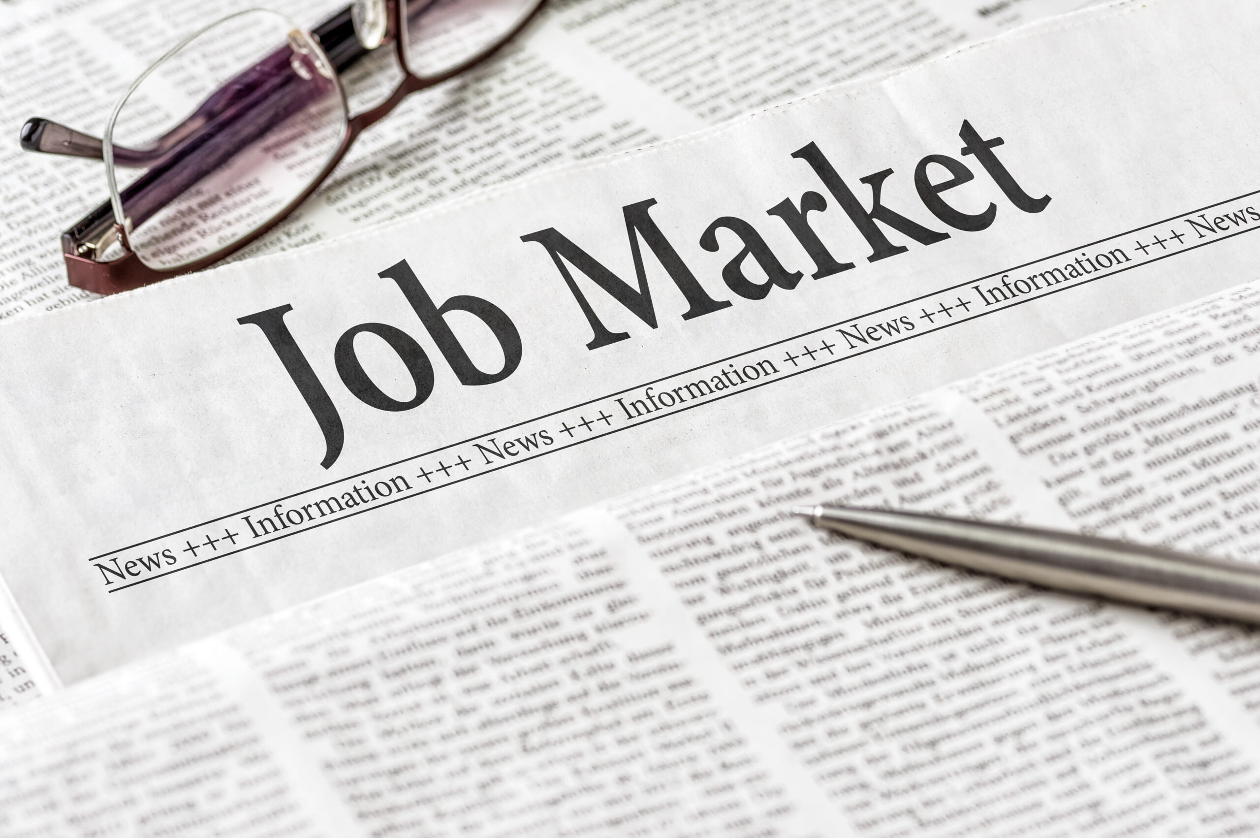A,Newspaper,With,The,Headline,Job,Market